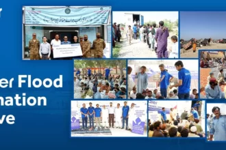 A group of flood survivors working together to rebuild their community with the help of Haier's humanitarian initiatives.